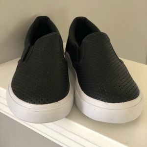 Black slip on sneakers